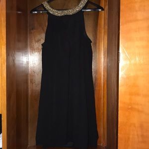 Black dress with beaded neckline